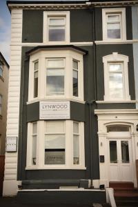 a black and white building with a hyundai sign on it at Lynwood House in Southport