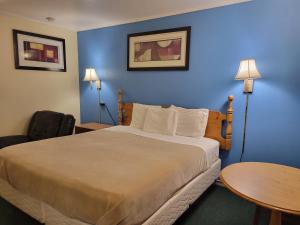 Postel nebo postele na pokoji v ubytování Budget Inn Motel Dalhart