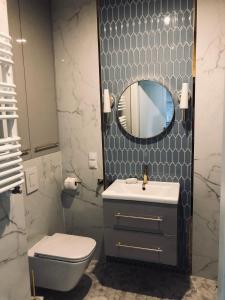 Kúpeľňa v ubytovaní Serce miasta Gdansk apartament + 18 fotografií