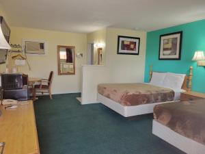 Postel nebo postele na pokoji v ubytování Budget Inn Motel Dalhart