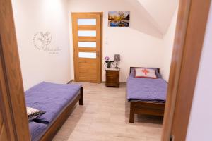 Posteľ alebo postele v izbe v ubytovaní Apartamenty Home&Spa