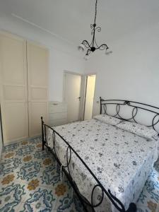 Posteľ alebo postele v izbe v ubytovaní Casa Petraquale