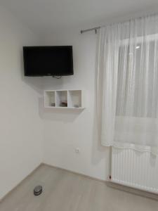 TV a/nebo společenská místnost v ubytování Apartman Markešić 3