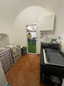 Kuchyň nebo kuchyňský kout v ubytování Holiday Home NomiS