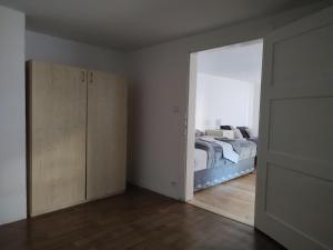 Posteľ alebo postele v izbe v ubytovaní Apartman BALA