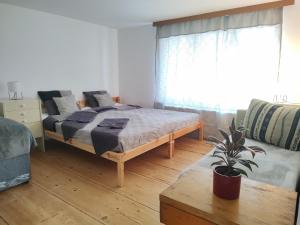 Posteľ alebo postele v izbe v ubytovaní Apartman BALA