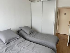 Posteľ alebo postele v izbe v ubytovaní Le Cocon de Mahé