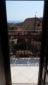a view from a window of a balcony at via vione 70 bis in San Bartolomeo al Mare