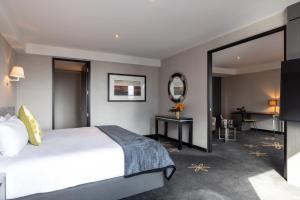 Posteľ alebo postele v izbe v ubytovaní SkyCity Hotel Auckland