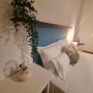 Łóżko lub łóżka w pokoju w obiekcie Casa M de mar - Dúplex con vistas