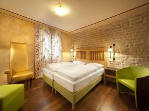 Кровать или кровати в номере Hotel Am Turm