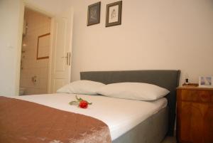 Katil atau katil-katil dalam bilik di Apartments and rooms with WiFi Komiza, Vis - 11315