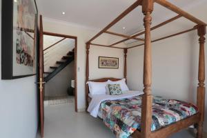 Cama o camas de una habitación en Kubu Wira Villas