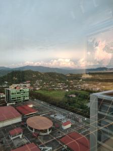a view of a city from the top of a building at Thirteen Residence [TR06] @ ITCC Manhattan Suites in Kota Kinabalu