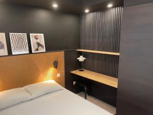 Posteľ alebo postele v izbe v ubytovaní Appartement Le Palais du Commerce
