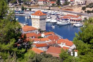 a group of boats docked in a harbor at Apartments with a parking space Marina, Trogir - 2036 in Marina