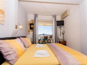 Ein Bett oder Betten in einem Zimmer der Unterkunft Villa Stil