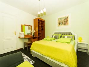 Ein Bett oder Betten in einem Zimmer der Unterkunft Villa Stil