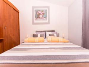 Ein Bett oder Betten in einem Zimmer der Unterkunft Villa Stil