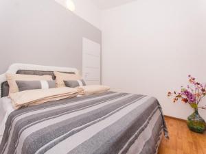 Ein Bett oder Betten in einem Zimmer der Unterkunft Villa Stil