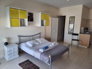 Ένα ή περισσότερα κρεβάτια σε δωμάτιο στο Panoramic Holidays - Standard 34 +10 φωτογραφίες