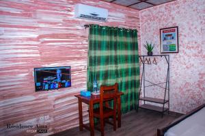TV a/nebo společenská místnost v ubytování RESIDENCE AINA