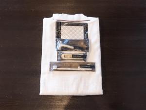 a group of tools sitting on a white napkin at Tabist Hotel New Osamura Sabae Inter in Fukui
