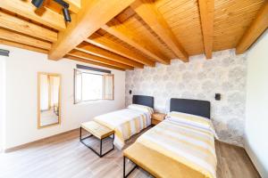Posteľ alebo postele v izbe v ubytovaní LAGA Surf VILLA by Urdaibai Rentals