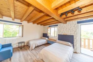 Posteľ alebo postele v izbe v ubytovaní LAGA Surf VILLA by Urdaibai Rentals