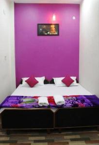Postel nebo postele na pokoji v ubytování RELAX PAYING GUEST HOUSE