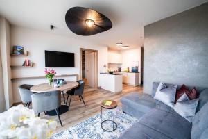 Μια τηλεόραση ή/και κέντρο ψυχαγωγίας στο La Rosea - Fine Living Apartments