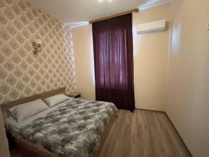 Voodi või voodid majutusasutuse Hotel Alley toas