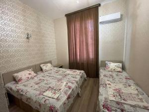Voodi või voodid majutusasutuse Hotel Alley toas