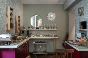 Cuisine ou kitchenette dans l'établissement Boutique Hotel Galatea