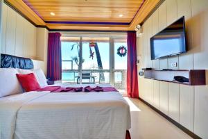 TV a/nebo společenská místnost v ubytování Diamond Water Edge Resort