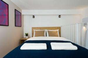 Llit o llits en una habitació de Musrara #2