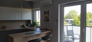 Kuchyňa alebo kuchynka v ubytovaní Apartament z widokiem