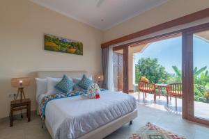 Villa Mata Hari客房内的一张或多张床位