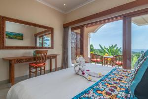 Villa Mata Hari客房内的一张或多张床位