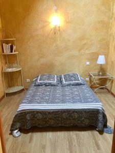 Postel nebo postele na pokoji v ubytování Gîte Le Roucoul
