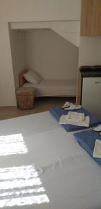 Postel nebo postele na pokoji v ubytování Apartmani Jacimovic
