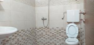 Koupelna v ubytování Apartmani Jacimovic