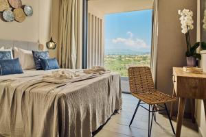 Posteľ alebo postele v izbe v ubytovaní Althea Lavish Estate - Villa & Suite