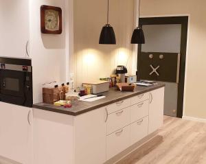 Virtuvė arba virtuvėlė apgyvendinimo įstaigoje Banken Bed & Breakfast
