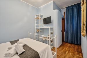 Postel nebo postele na pokoji v ubytování Piccolo Vecellio