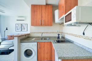 A kitchen or kitchenette at iloftmalaga Carretería - Puerta de Antequera