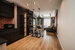 Kuchyňa alebo kuchynka v ubytovaní Loft Apartament Aleje Wolności Nowy Sącz
