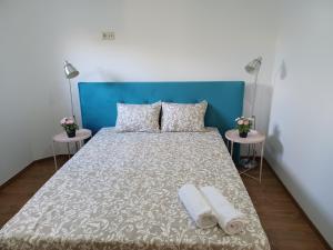 Postel nebo postele na pokoji v ubytování Enjoy Oporto Campanha 1