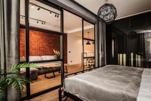 Posteľ alebo postele v izbe v ubytovaní Loft Apartament Aleje Wolności Nowy Sącz