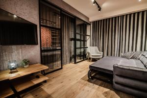 Postel nebo postele na pokoji v ubytování Loft Apartament Aleje Wolności Nowy Sącz